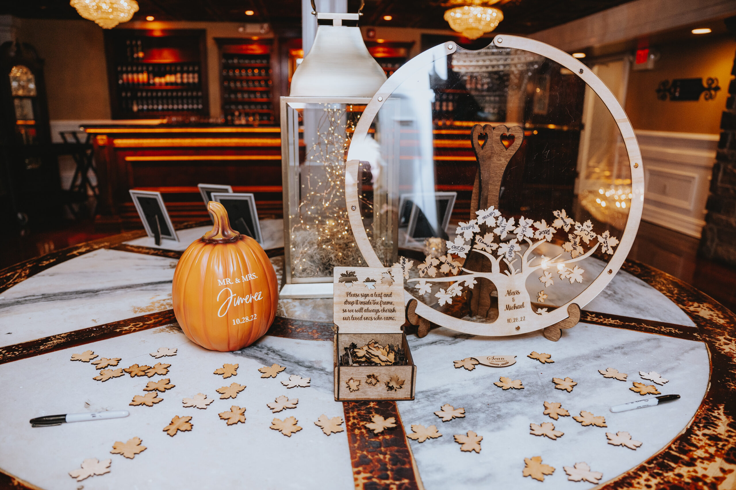This wooden-leaf guest book is a fun wedding decor idea for a fall wedding.
