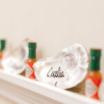 A Coastal Wedding Featuring an Oyster Shell Seating Chart