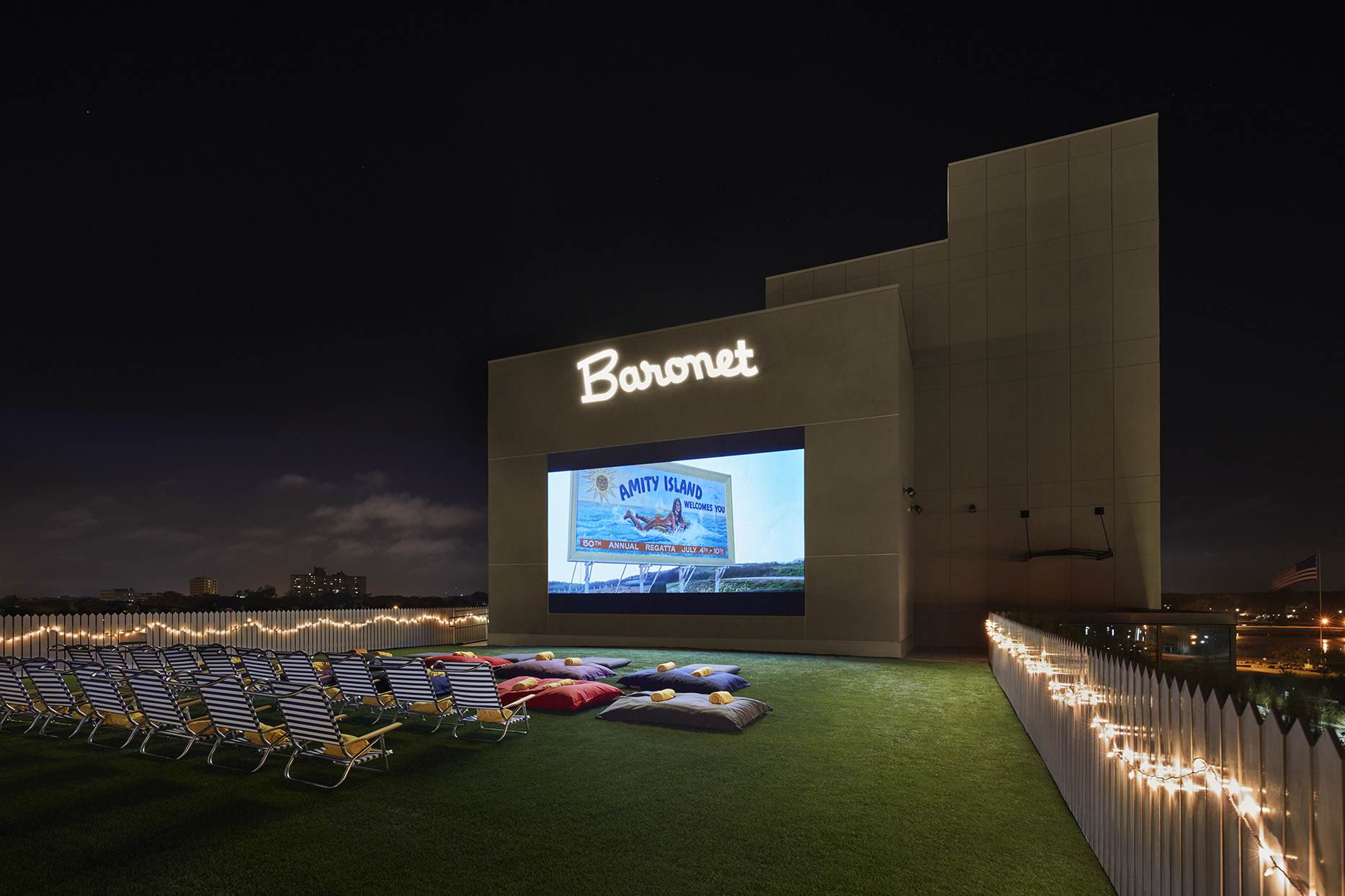 A movie screen set up on the rooftop of The Asbury in Asbury Park, a fun New Jersey bachelorette party spot.