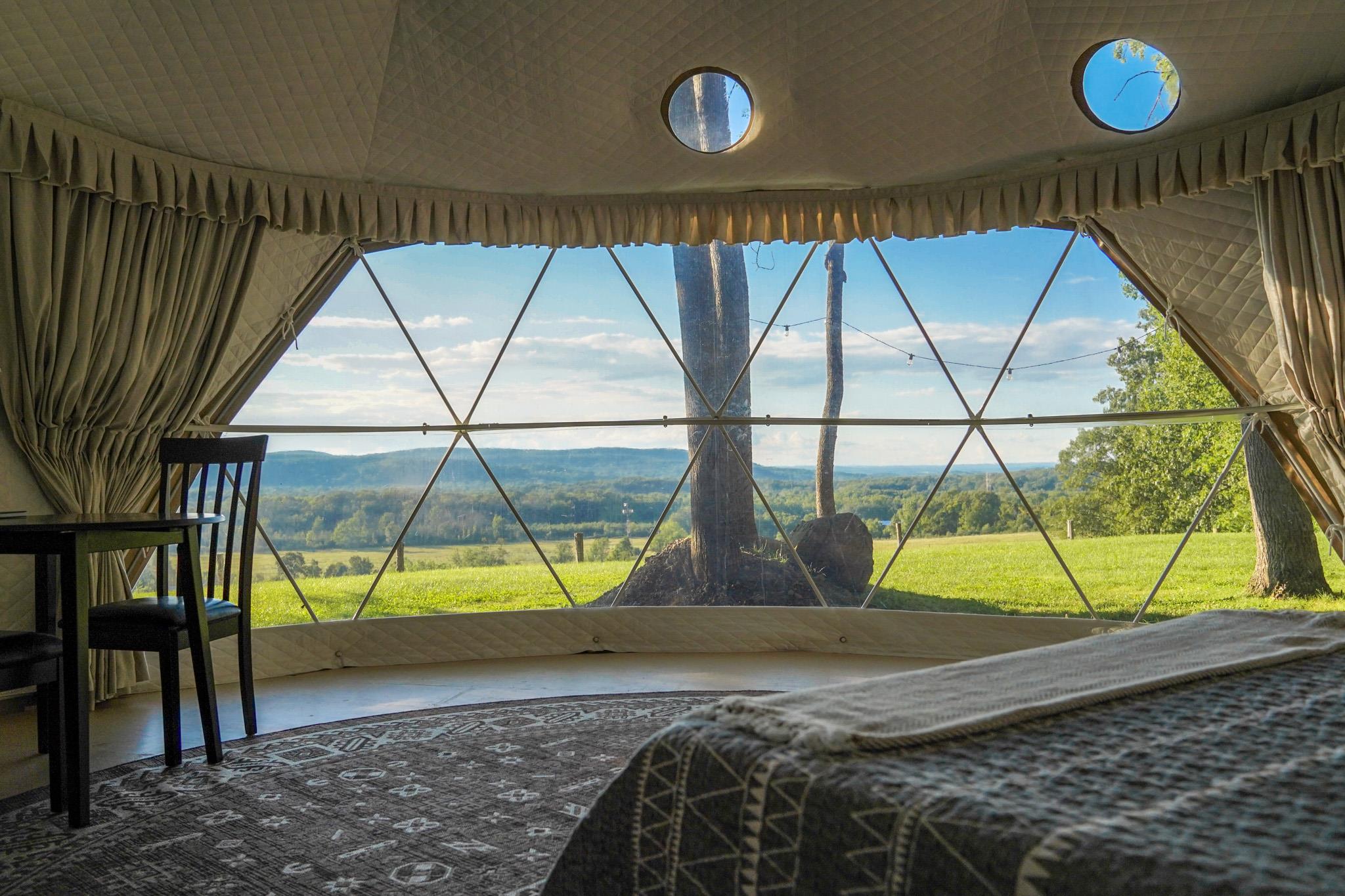 The view from inside a glamping tent at Moon Valley Campground, a fun New Jersey bachelorette party spot.