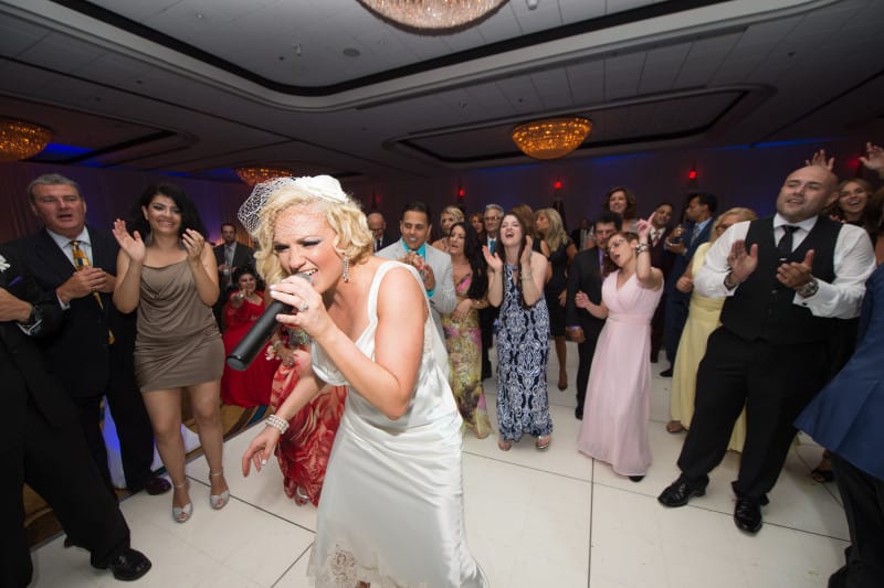 New Jersey Bride—Bride singing: Tami and Arial at Teaneck Marriott at Glenpointe. Dave Shay Photography.