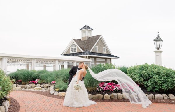 The wedding of A Waterfront Wedding Focused on Friendship With White, Pink & Blue Florals Gallery 9
