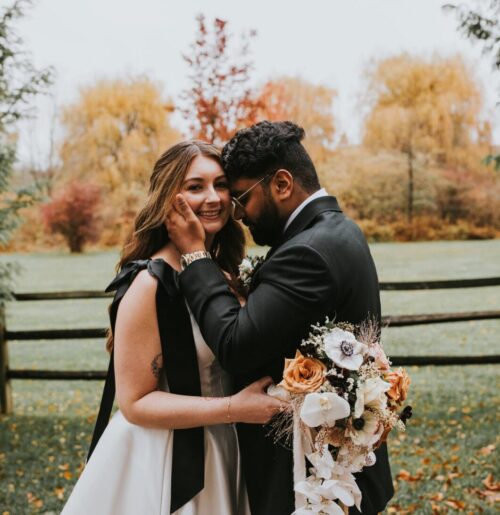 The wedding of This Couple Blended Their Different Backgrounds in a Romantic Fall Wedding