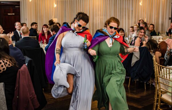 The wedding of These Brides Celebrated Their Love of Rugby at Their Running Deer Golf Club Wedding Gallery 12