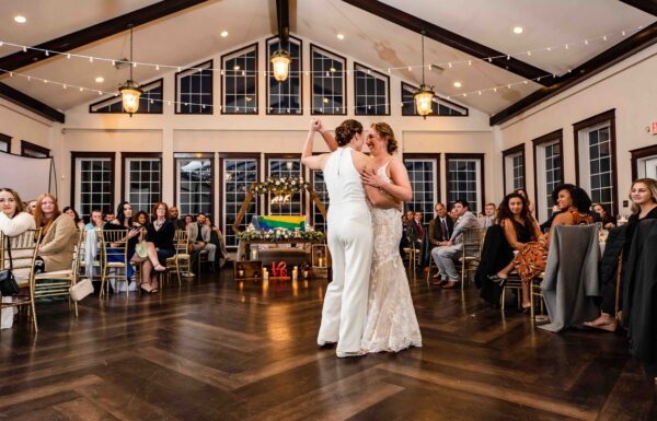 The wedding of These Brides Celebrated Their Love of Rugby at Their Running Deer Golf Club Wedding Gallery 13