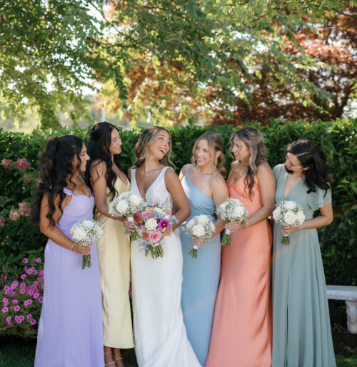 The wedding of Coastal Wedding With Mismatched Pastel Bridesmaid Dresses