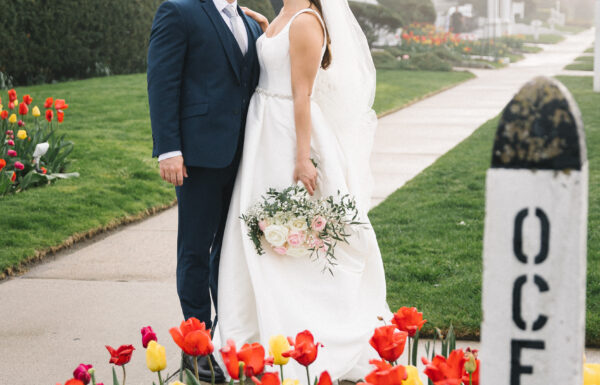 The wedding of Thrifted Candlestick Holders And Frames Added a Vintage Vibe to Their Hotel Wedding at The Shore A wedding at Breakers on the Ocean. Gallery 4