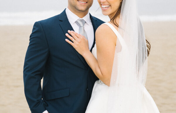 The wedding of Thrifted Candlestick Holders And Frames Added a Vintage Vibe to Their Hotel Wedding at The Shore A wedding at Breakers on the Ocean. Gallery 7