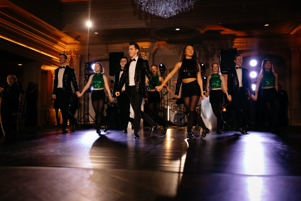 Ballroom wedding at the Park Savoy Estate at Florham Park NJ with tons of Irish details like a green cake, Guinness station and Irish step dancers.